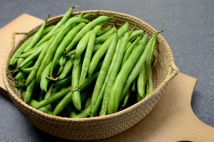 Why do my green beans taste sour?